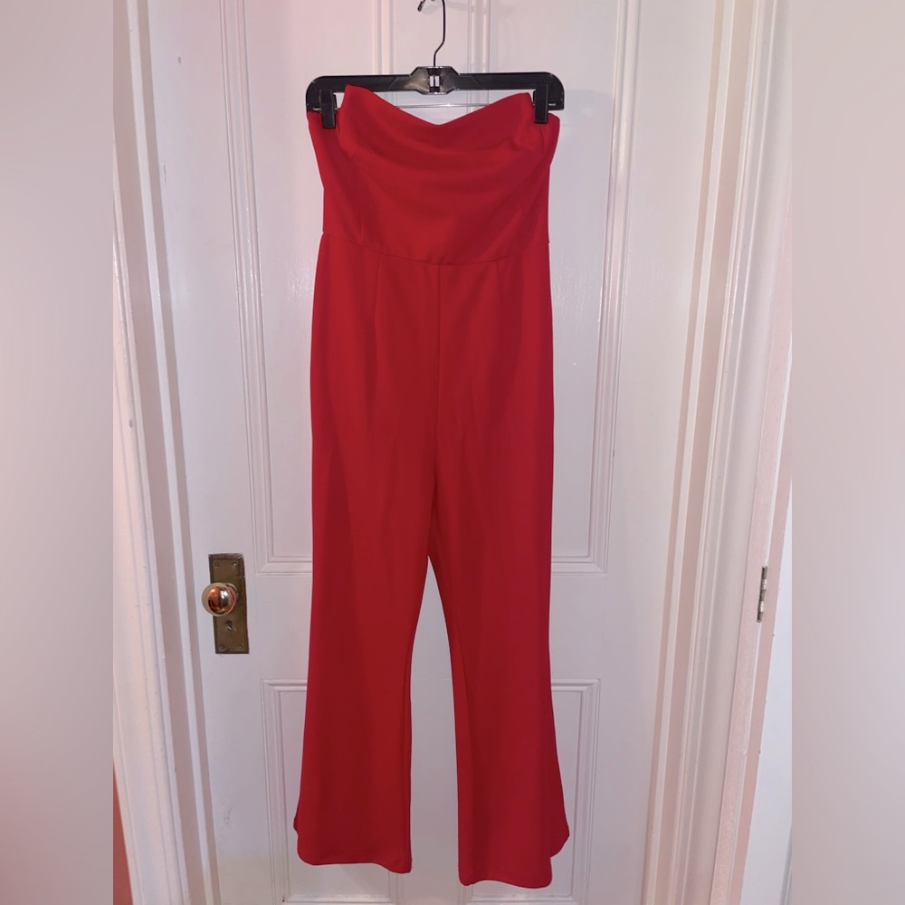 Red jumpsuit, worn once for two hours. In perfect  condition.